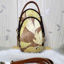 Picture of Small Leather Backpack with brown yellow Botanical Print | Komang Darmiani