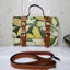 Picture of Botanical Compact ladies handbag - green with tan straps | Komang Darmiani