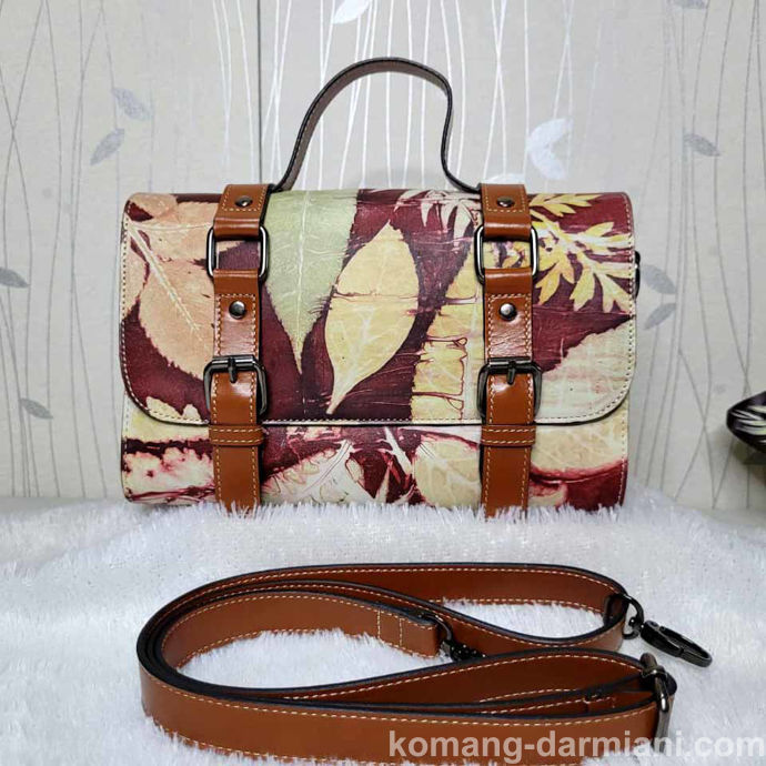 Picture of Botanical Compact ladies handbag - burgundy and yellow with tan straps | Komang Darmiani